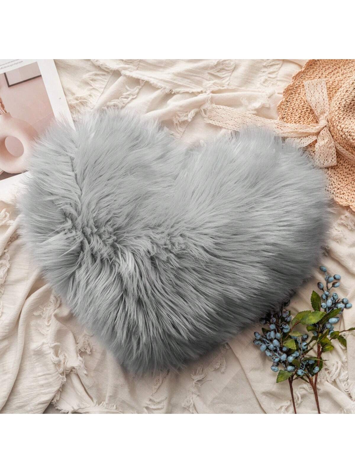 Coussin cœur en peluche