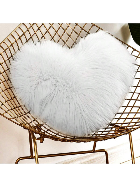 Coussin cœur en peluche