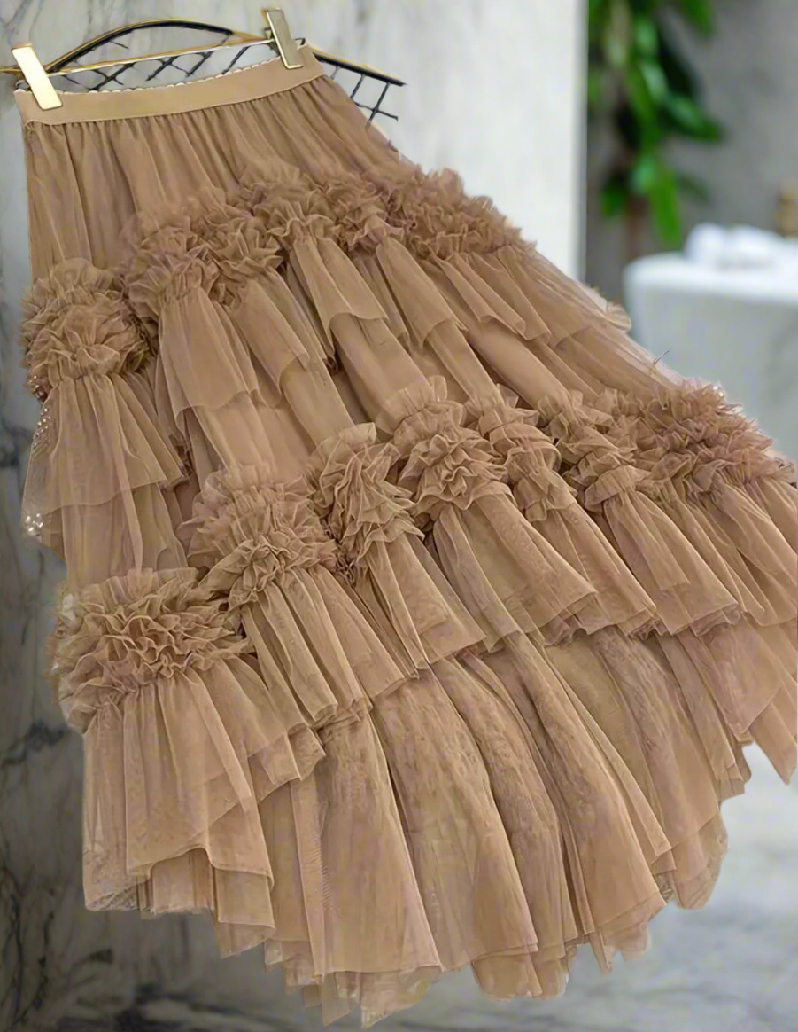 Jupe tulle plissée

Apporte une texture dynamique et un style structuré. 