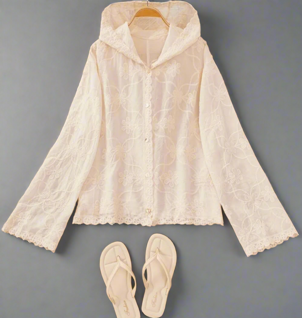 Chemisier brodé beige 

Pour un look élégant et intemporel