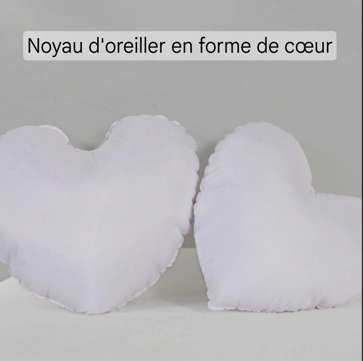 Coussin cœur en peluche