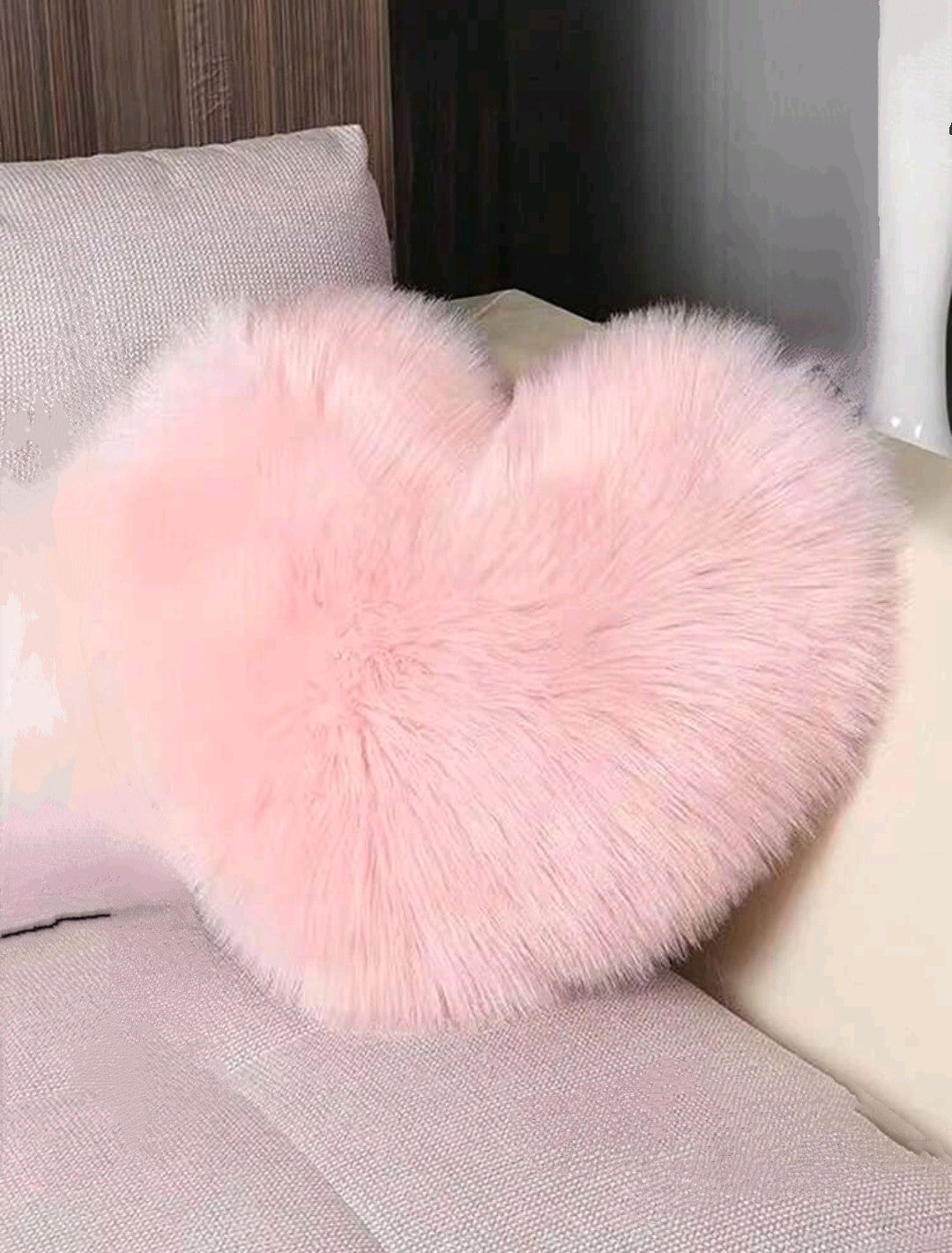 Coussin cœur en peluche